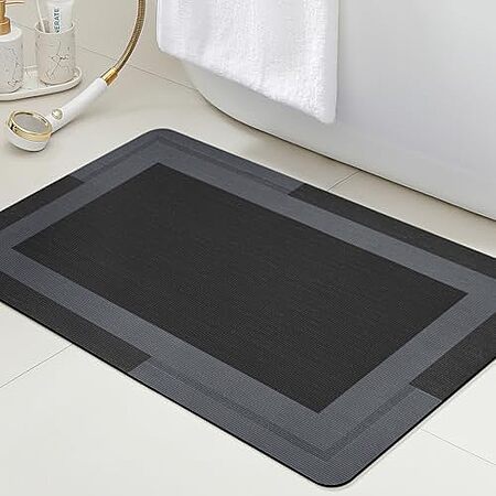 $5.94* | 24" x 17" ACCUMTEK Ultra-Thin Quick-Dry Non-Slip Bath Mat Rug at Amazon