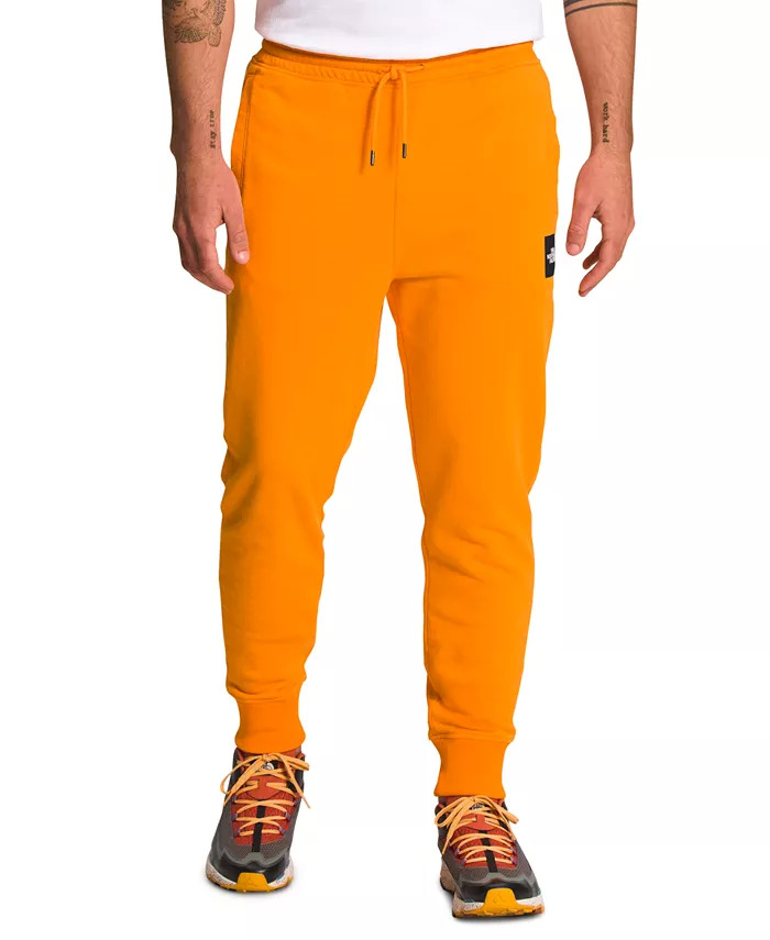THE NORTH FACE Men's Box NSE 'Never Stop Exploring' Jogger Sweatpants (Orange, Gold, Blue, Black) $22 at Macy's w/ Free Store Pickup or Free S&H on $25+