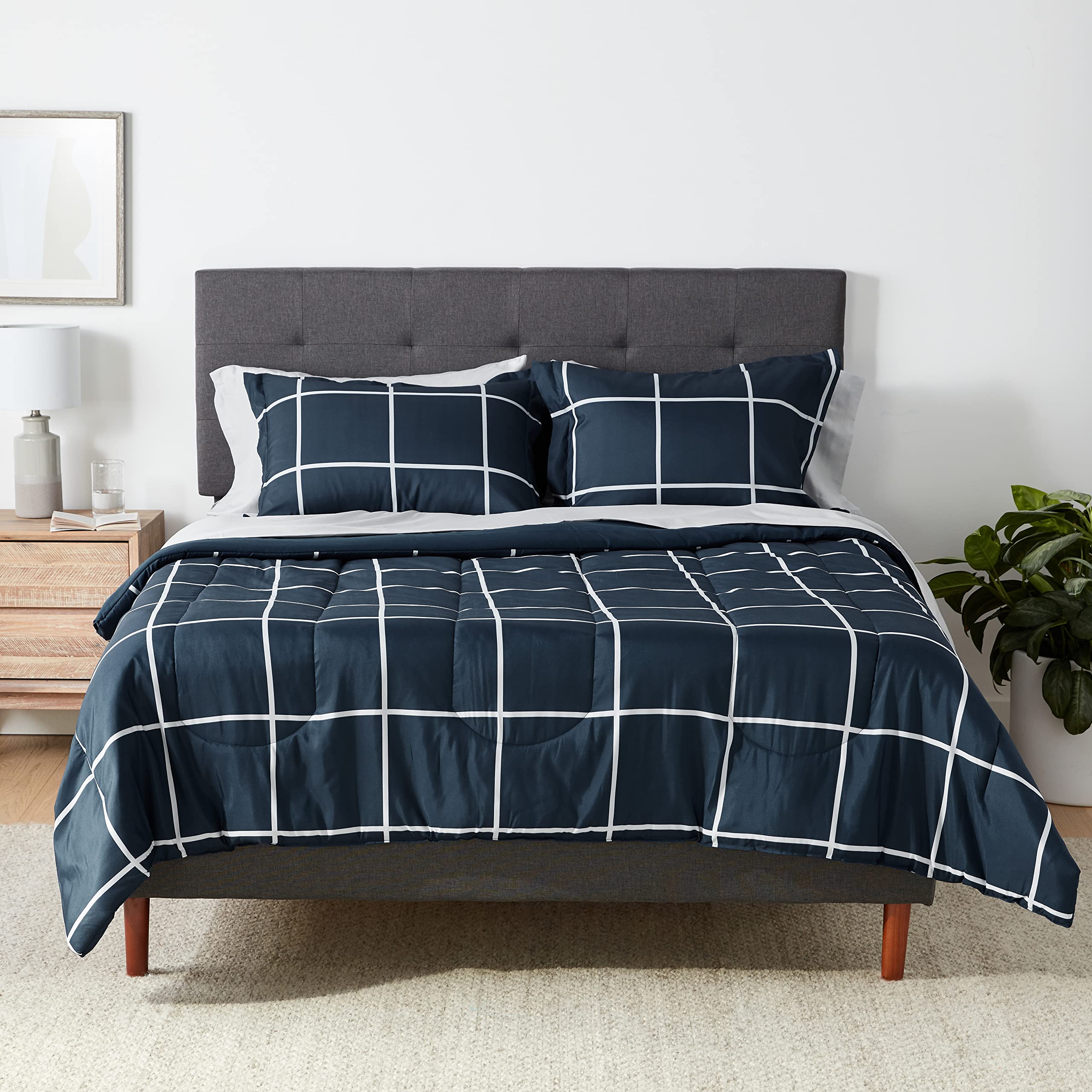 7-Piece Amazon Basics Lightweight Microfiber Bed-in-a-Bag Comforter Bedding Set (Full/Queen, Navy Plaid) $26.85 + Free Shipping w/ Prime or on $35+