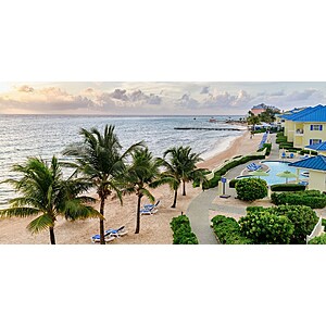 Travelzoo Members: Wyndham Reef Resort Grand Cayman 4-Night Stay for 2 With F&B & Spa Credit $  999