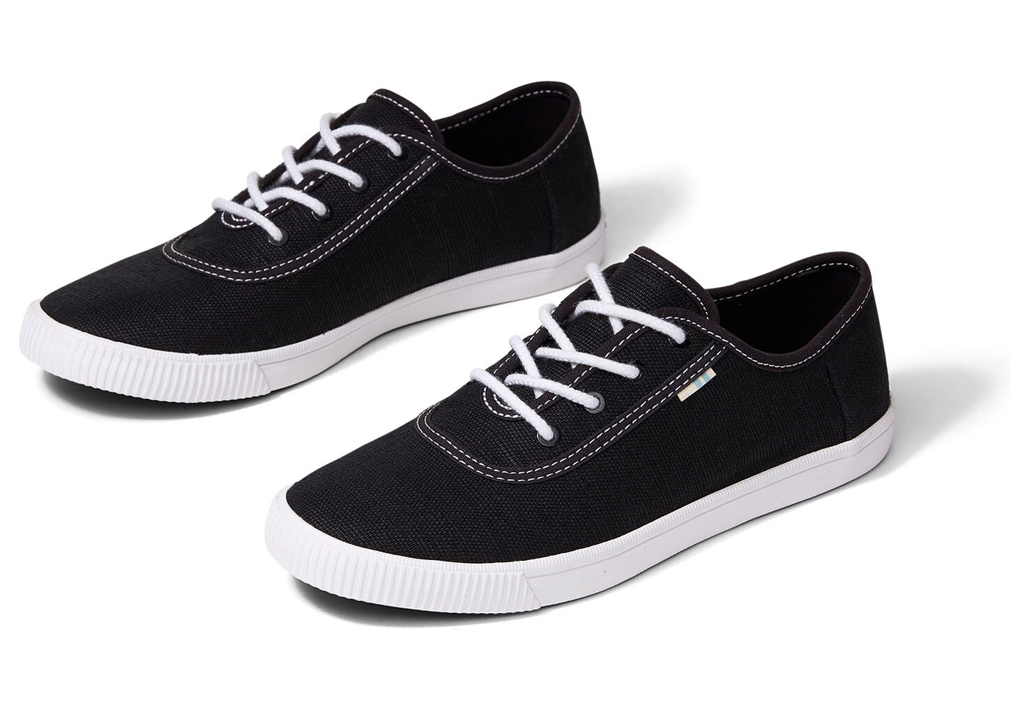 Toms Shoes: Men's Forged Iron Grey Space Dye Flip-Flops $20, Women's Black Contrast Stitch Sneakers $20 & More + FS on $75+