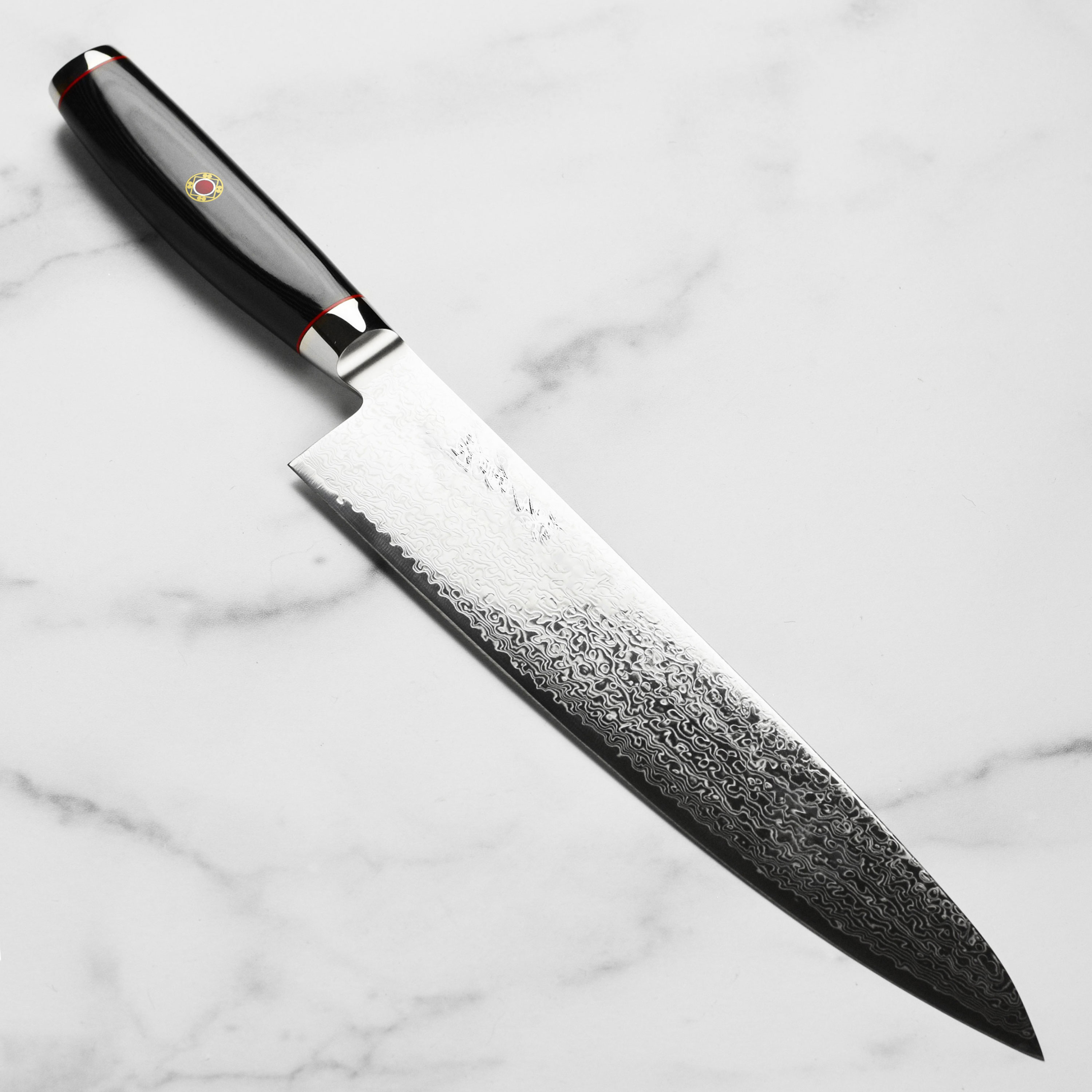 Cutlery and More Japanese Knife Sale: 8" Yaxell Mon Chef's Knife w/ Hollow Edge $60 & More + Free Shipping