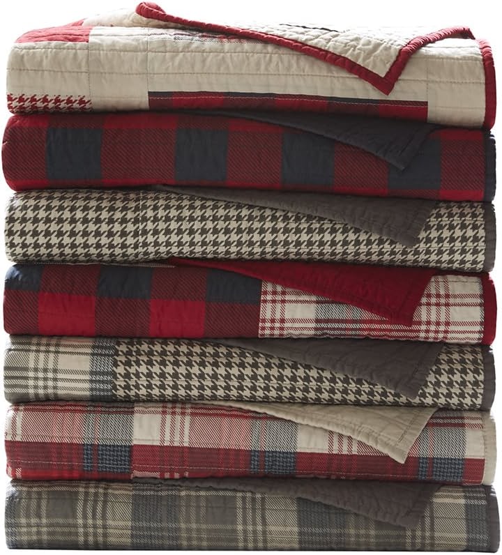 Prime Members: 50" x 70" Woolrich Plaid Sunset Red Quilted Throw $29 & More + Free Shipping