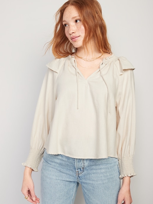 Old Navy: Women's Puff-Sleeve White-Wash Ruffle-Trimmed Smocked Jean Blouse (Ecru) $11, Women's Mid-Rise Pop Icon Skinny Jeans (Dark Wash) $12, & More + Free Shipping $50+