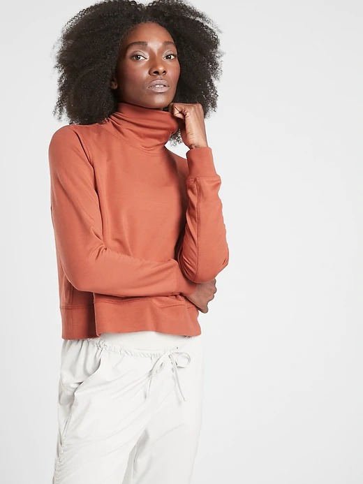 Athleta: Cropped Nirvana Funnel Neck $16, Zion Microfleece Half-Zip $26.39, Waterfall Top $19.20 + Free Curbside Pickup