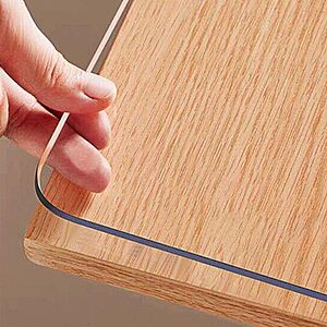Prime Members: 14" x 24" OstepDecor 1.5mm Clear PVC Desk Mat & Table Protector $7.60 + Free S&H