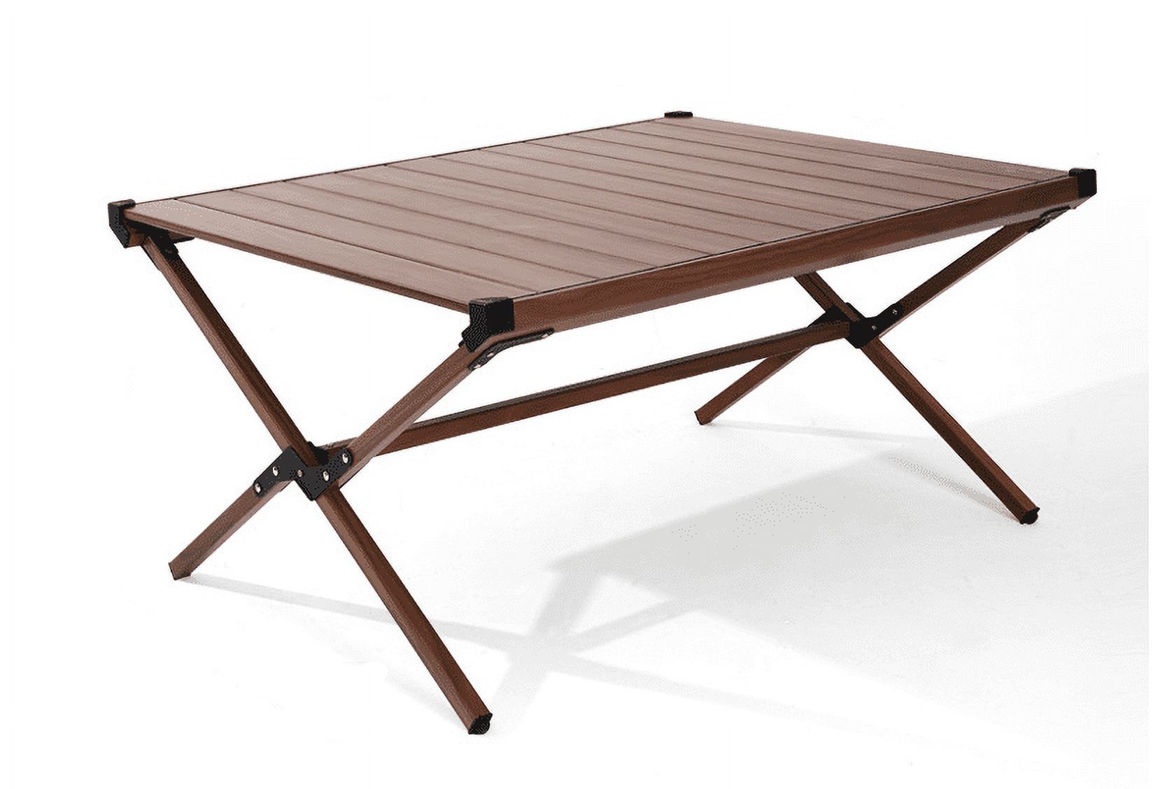 Ozark Trail Aluminum Roll-Top Camping Table,   YMMV.   In store. I just got 1. Dark Brown $17